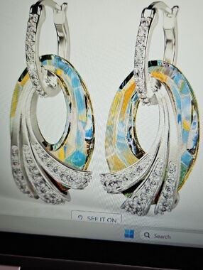 Danbury Mint shimmering sea crystal pendant and matching earrings. 200.00+